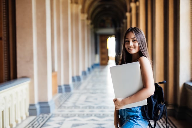 young-asian-student-university-campus-with-laptop-min
